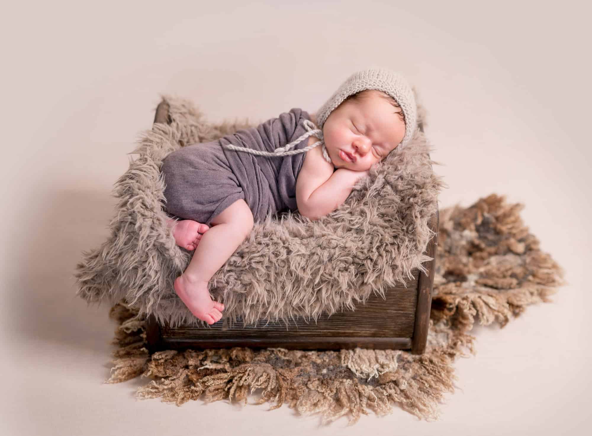 Sleeping newborn baby boy